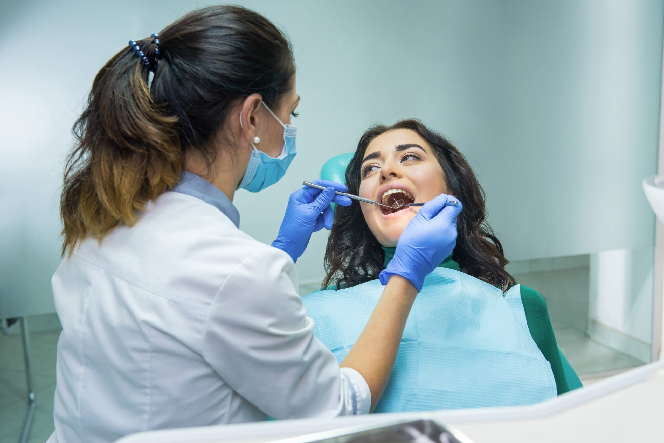 Woman,At,The,Dentist.,Stomatologist,In,Mask,Working.,Oral,Health
